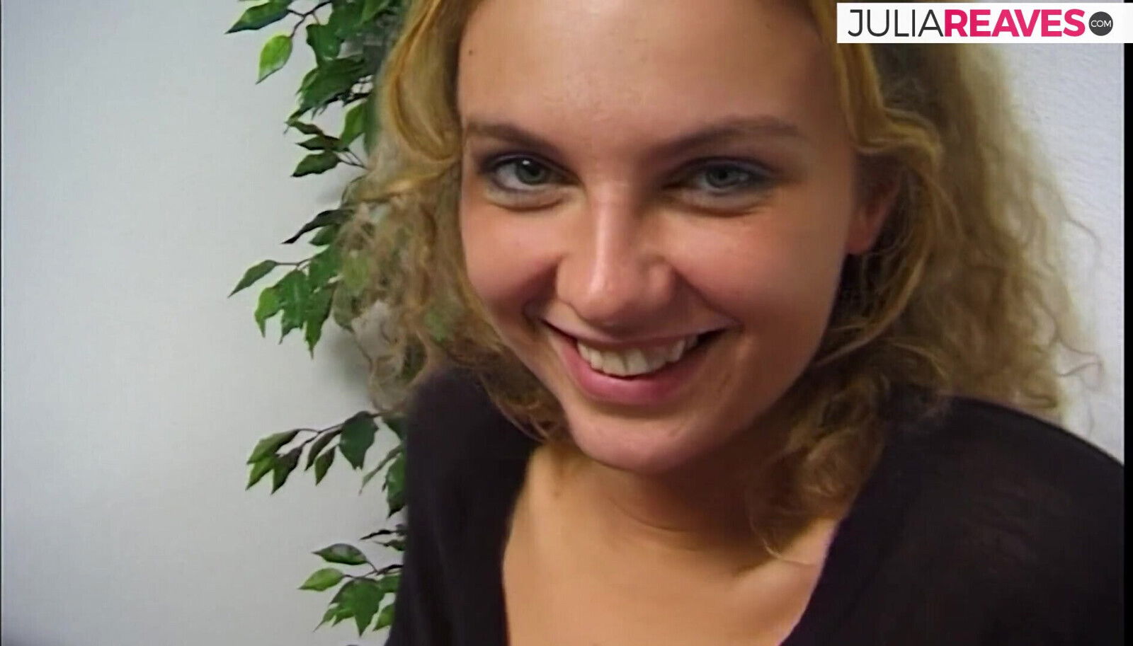 Blonde girl strips spreads legs