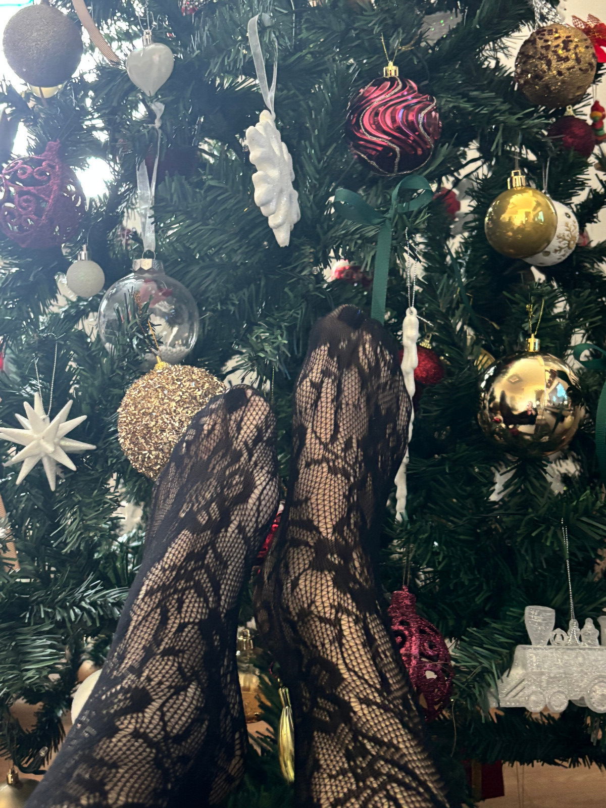 Playing with christmas three with legs stockings