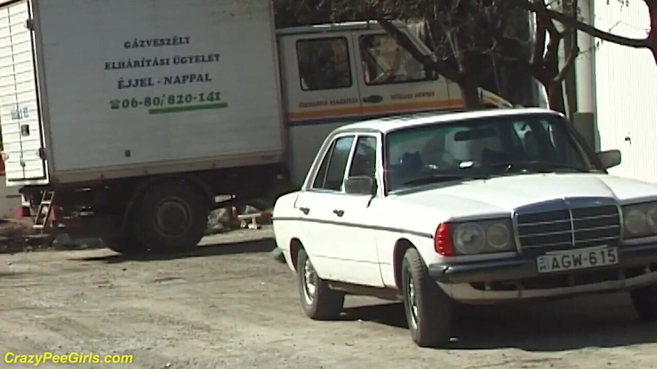 Crazy girl peeing street