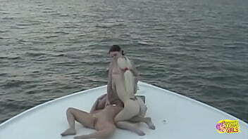 Three horny amateur lesbians eat each others pussies and masturbate while on a boat trip