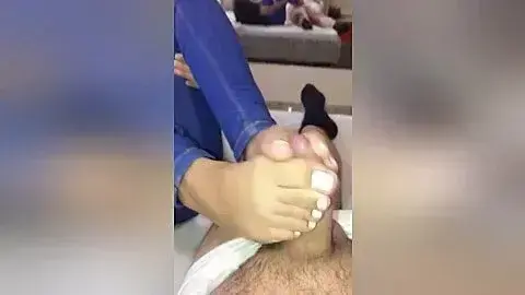 Girlfriend In Blue Jeans Strokes With Her Toes And Feet