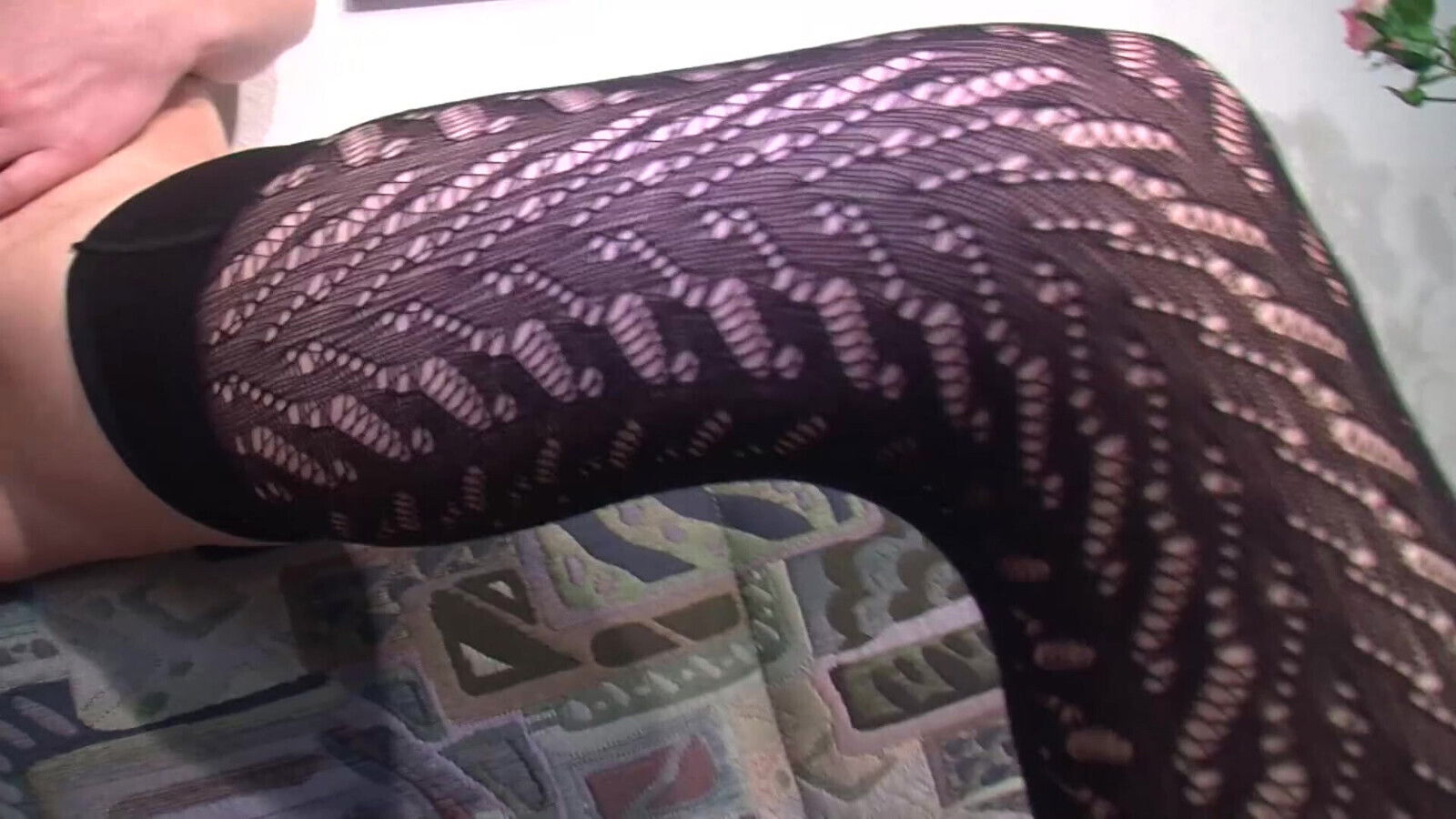 Brunette German slut in stockings fucks herself with orange dildo