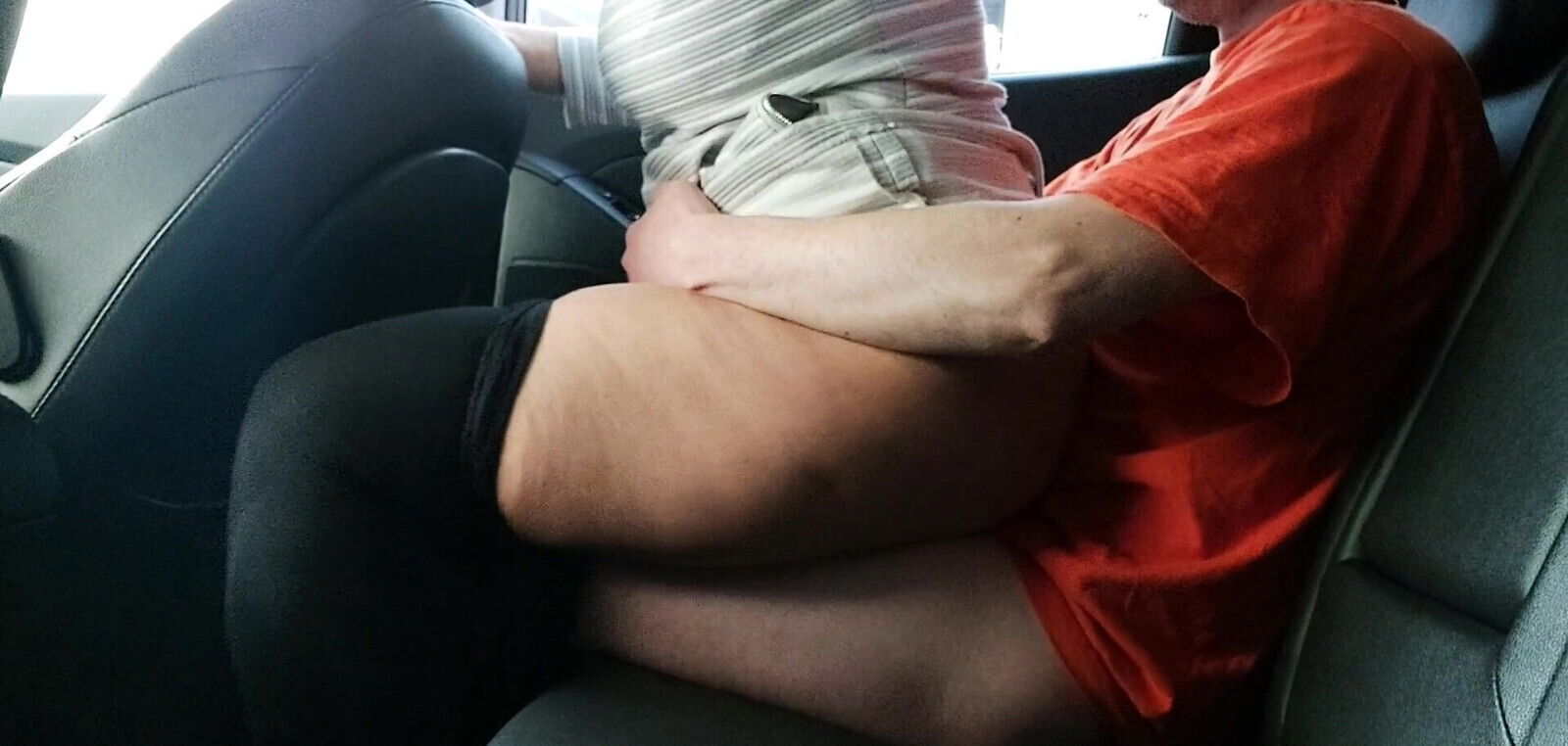 Stepmom rides her stepson in the car in public and moans with pleasure