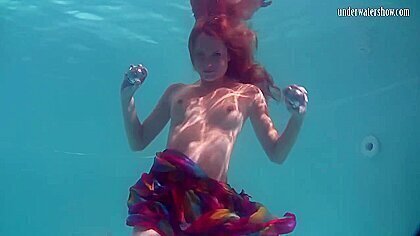 Redhead Baby Nikita Vodorezova Gets Naked Underwater