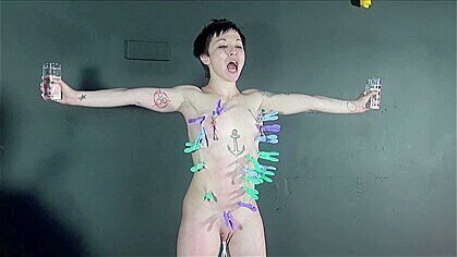 Asian BDSM of Mei Mara pegged and whipped