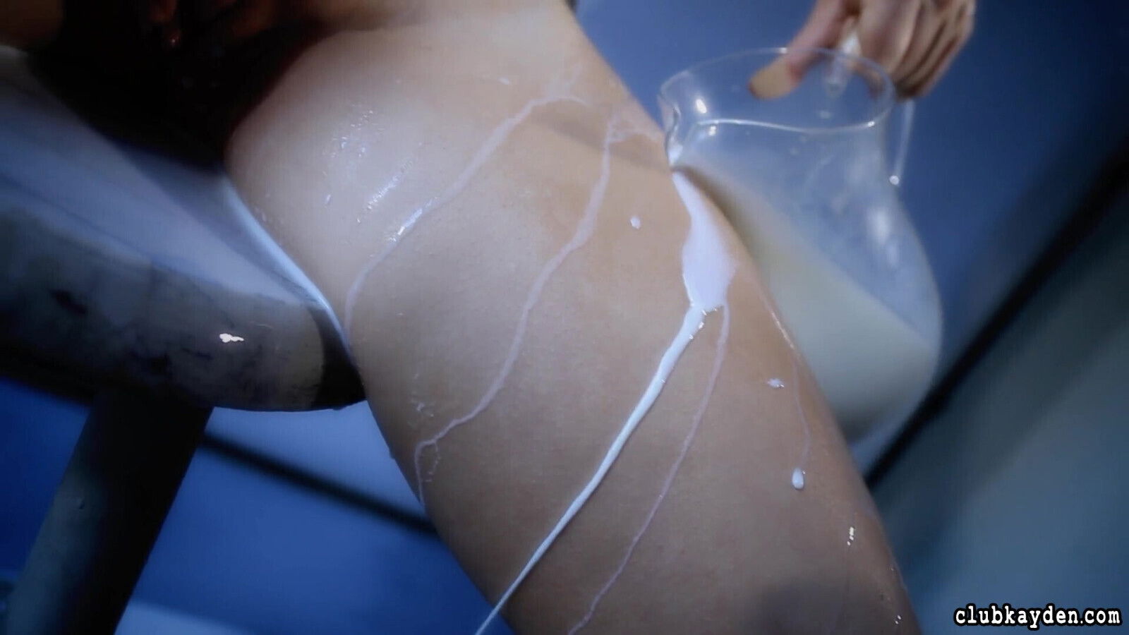 Kayden Kross pouring milk over her incredible naked body