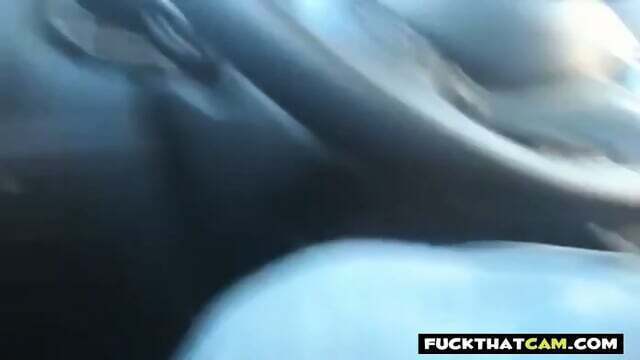 Car Sex With a Busty MILF Caught on Webcam