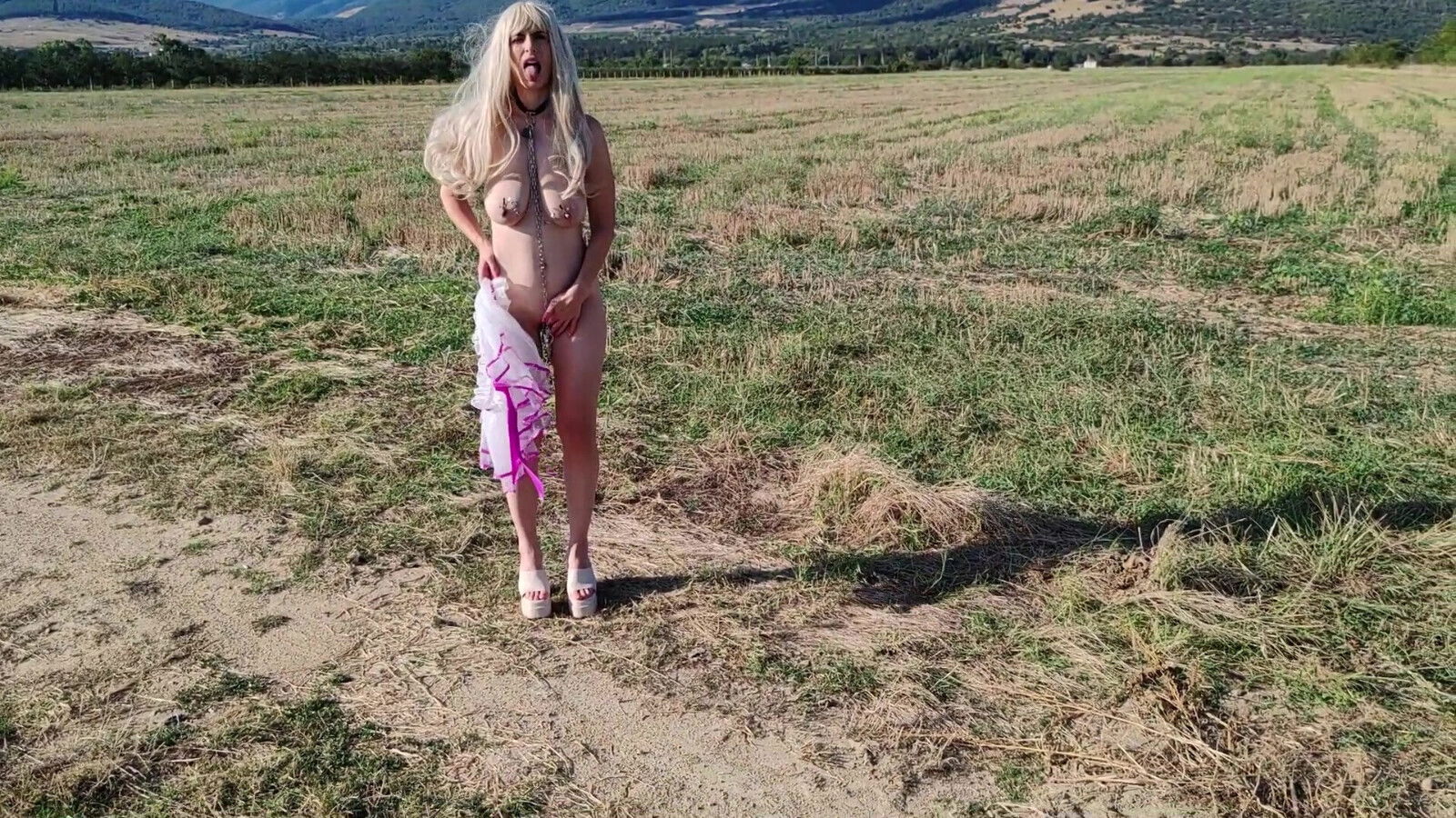 Slave Tih Ie Walks in Skirt and Clitoral Chains