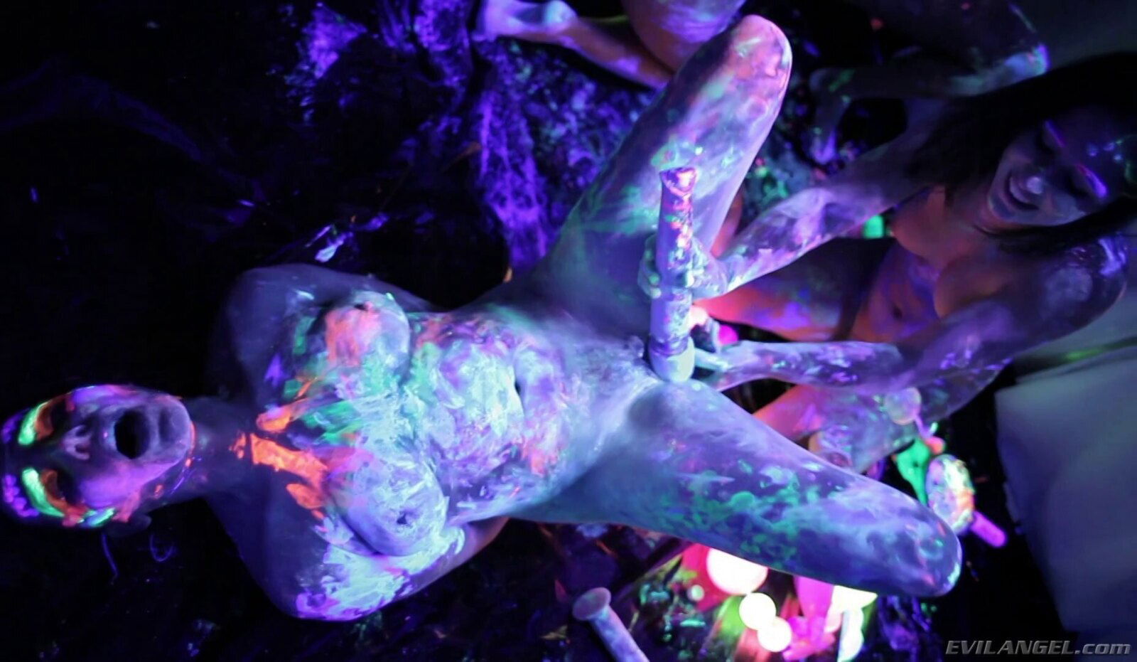 Black light lesbian orgy party with sexy body paint