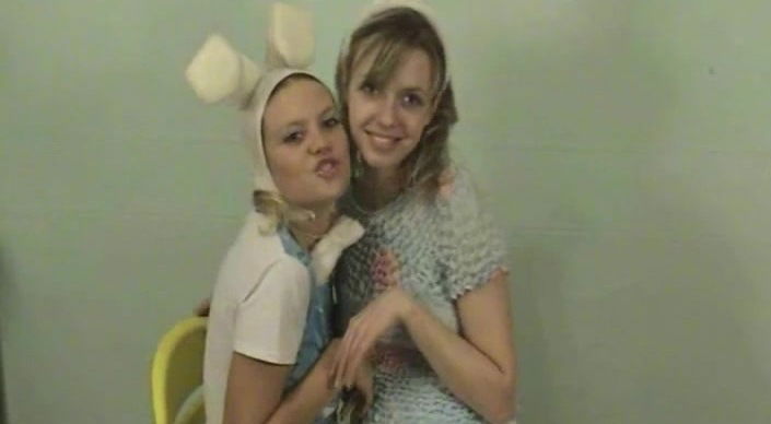 Amber is playing with her sister bunny