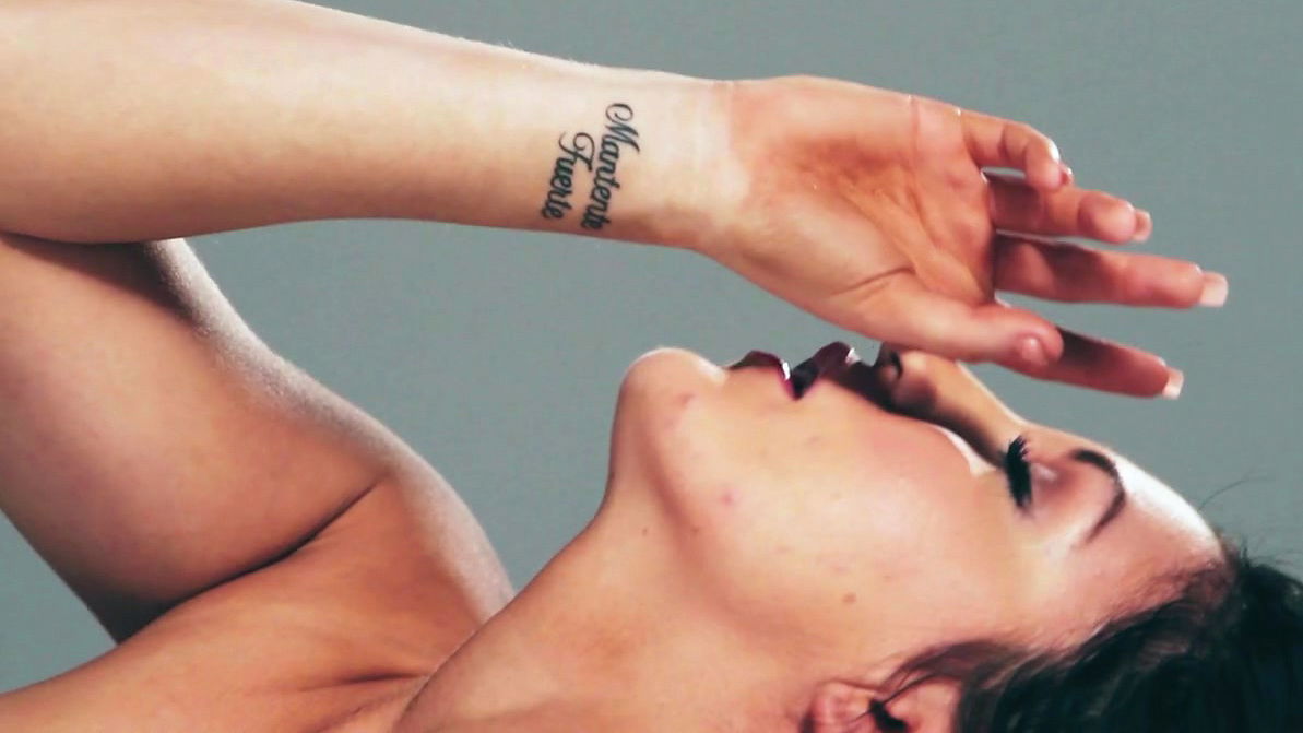 Slender brunette Alessandra Iltis is playing with her nylons