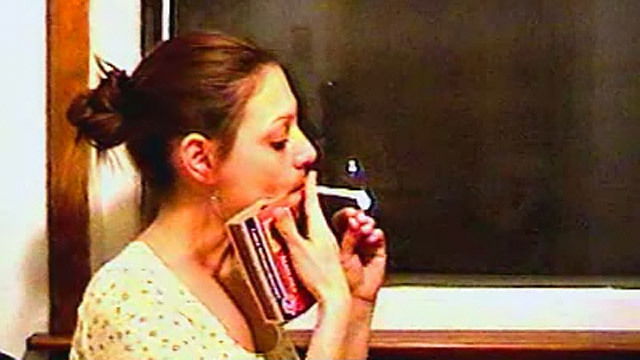 Milf lights cigarette smokes