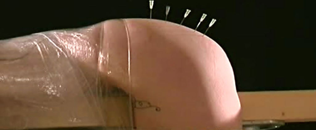 Light touch of kinky hot wax play