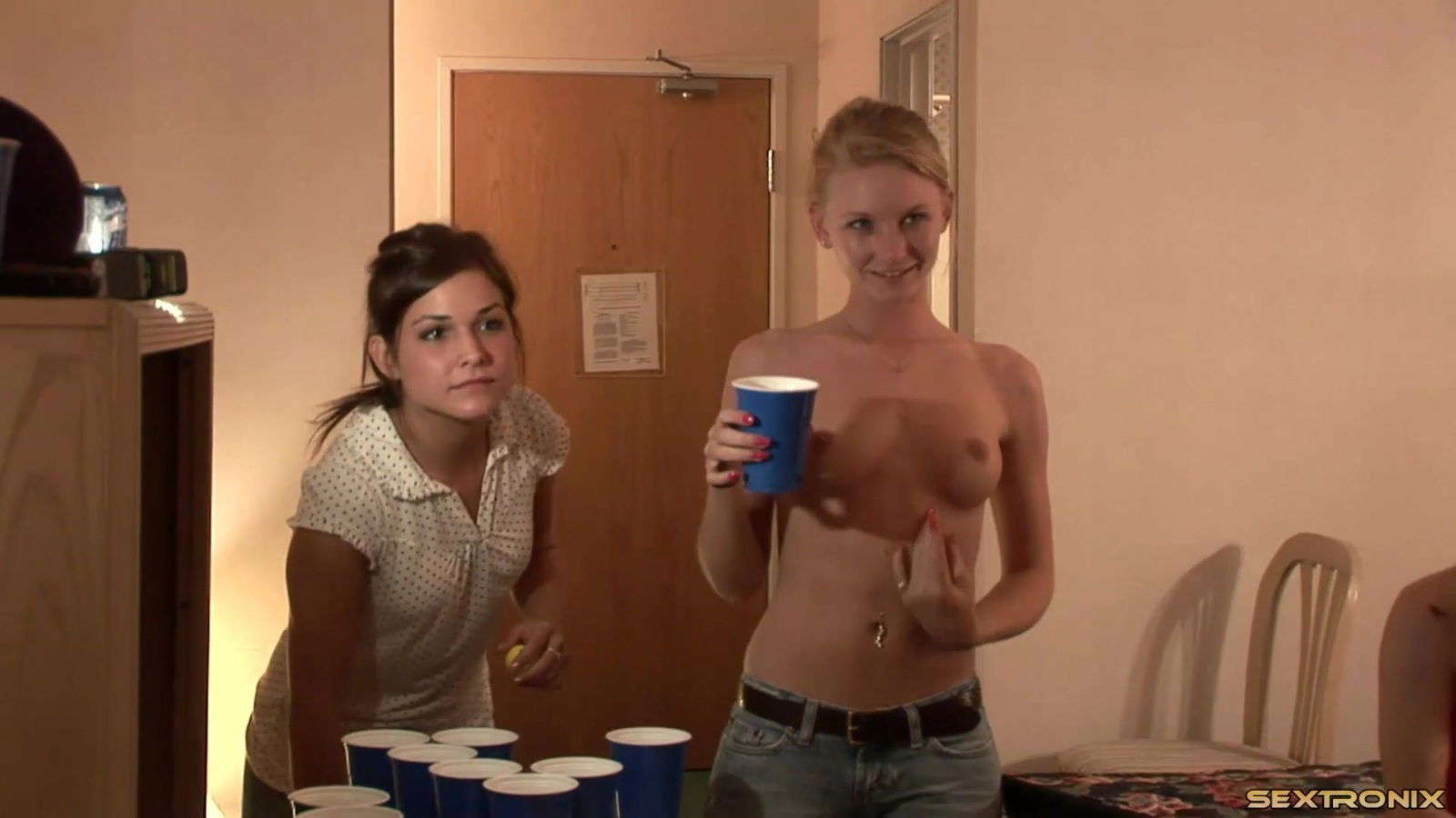 Strip beer pong in a hotel room means naked tits to ogle
