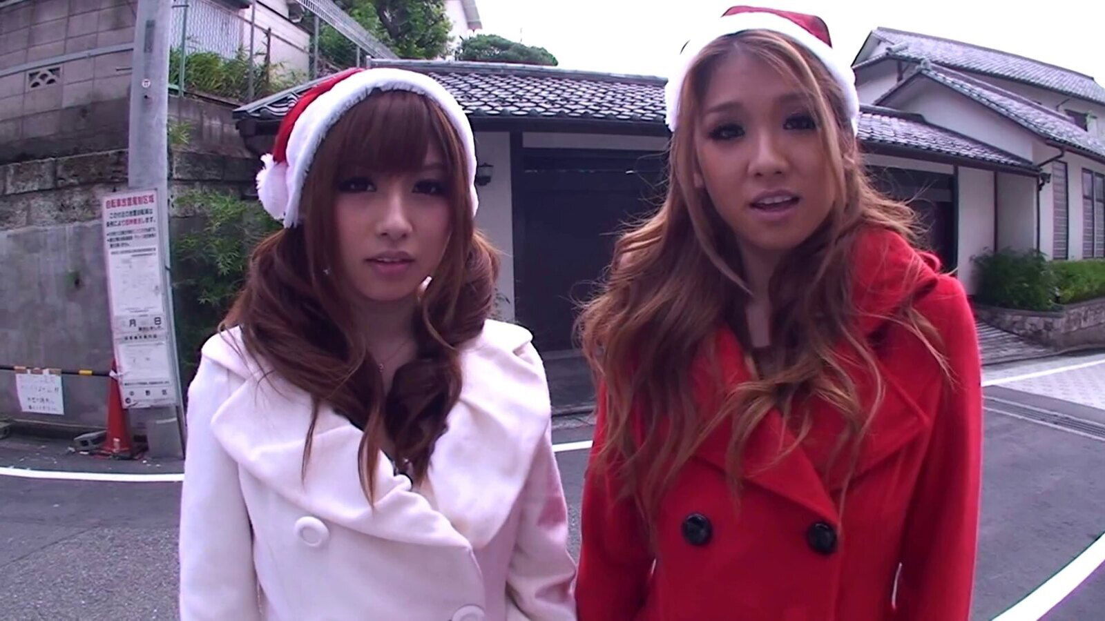 Two depraved Japanese Santa girls ride a shaft by turns in FFM reality