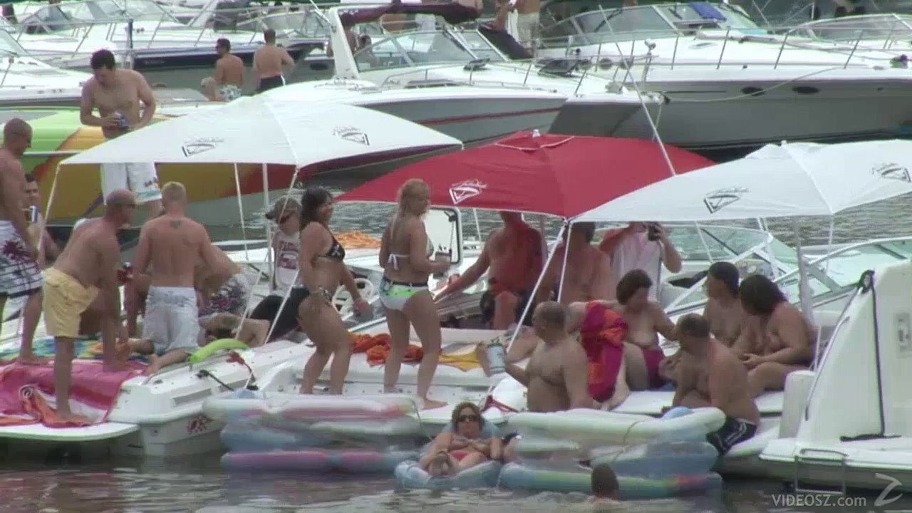 Some slutty chicks flash their nude bodies during beach party