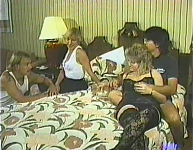 Retro video with kinky two swinger couples fucking in a bedroom