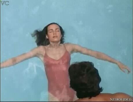 Stunning Babe Valerie Kaprisky Swimming in a See-Through Bathing Suit