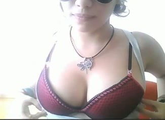 Hot Latin chick shows me her assets and pussy