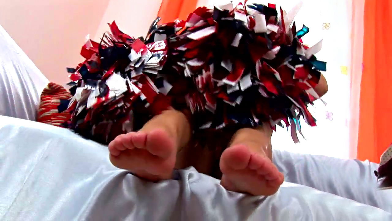 Sexy and hot cheerleader is showing her small tits