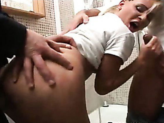 Busty blonde Honey Winter sucking hard cocks bathroom