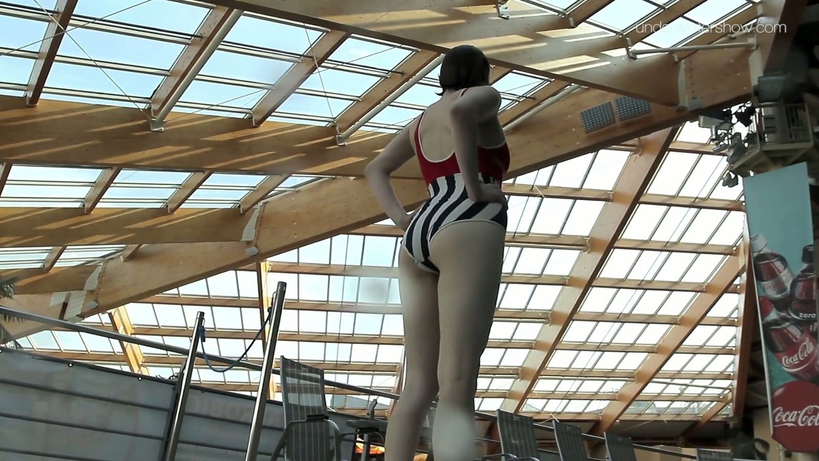 Lovely fresh pale skin teen bathing suit dives pool