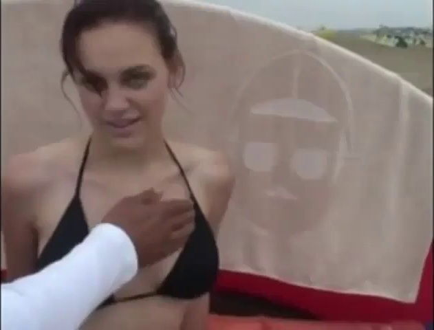 pearly blue gets analized at the beach