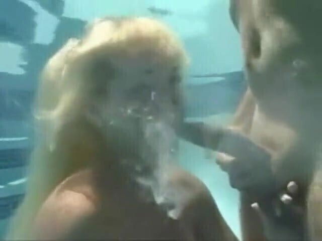Underwater surprise blowjob