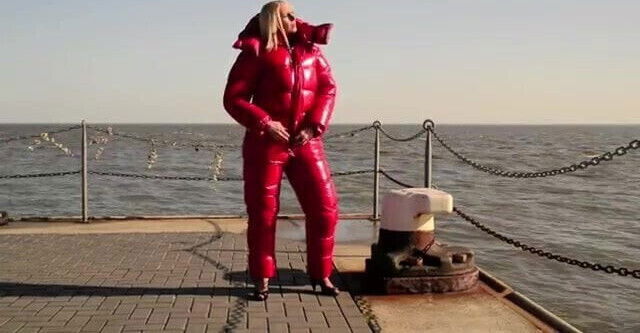 Blonde lady in sexy shiny suit!