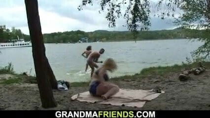 Old blonde granny and boys teen outdoor threesome