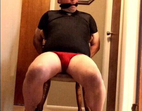 Bear tied to chair and made to cum