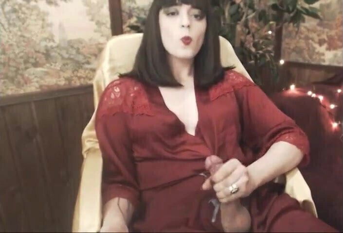 Transgender girl with Hugh Hefner rope