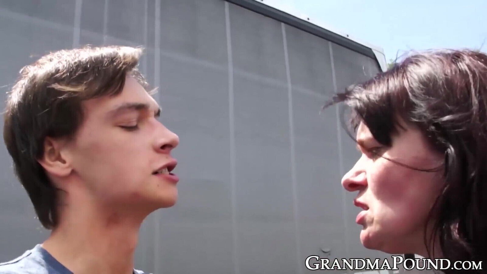 Busty grandma disciplines young cock with public handjob