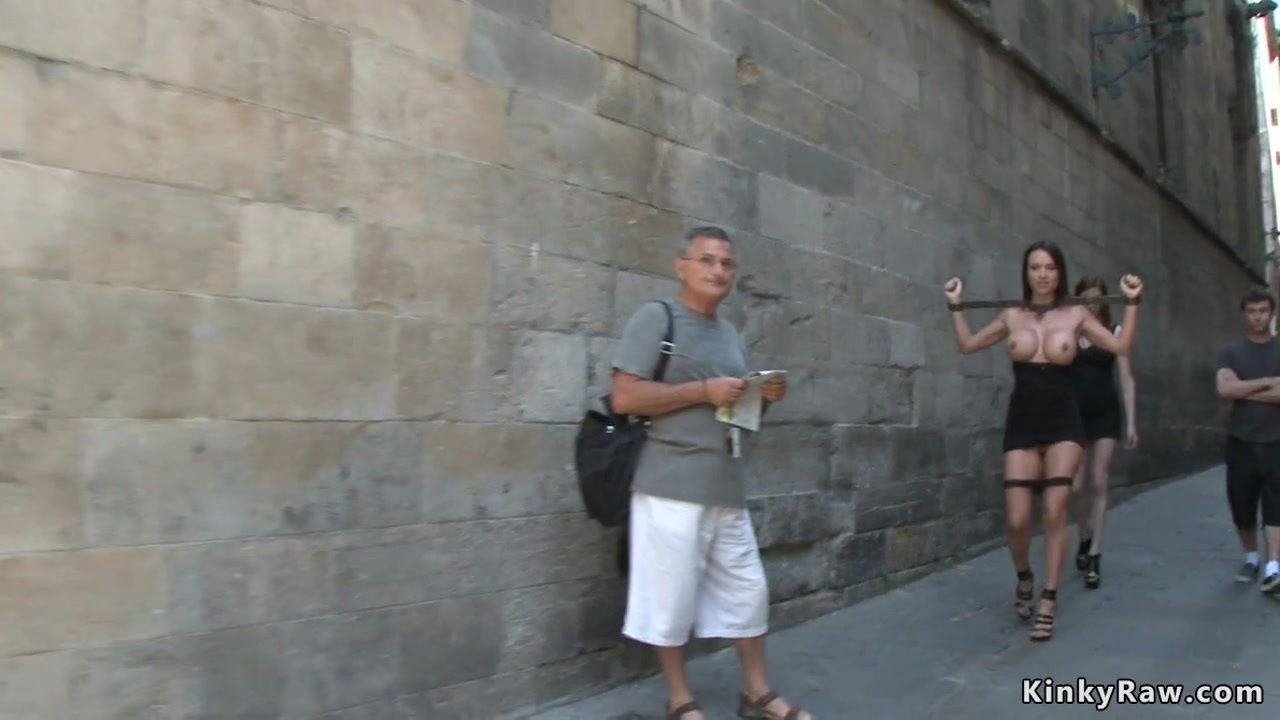 Darkhaired metal shackles public