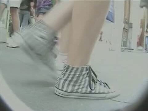 Candid upskirt voyeur loves gaping butts.