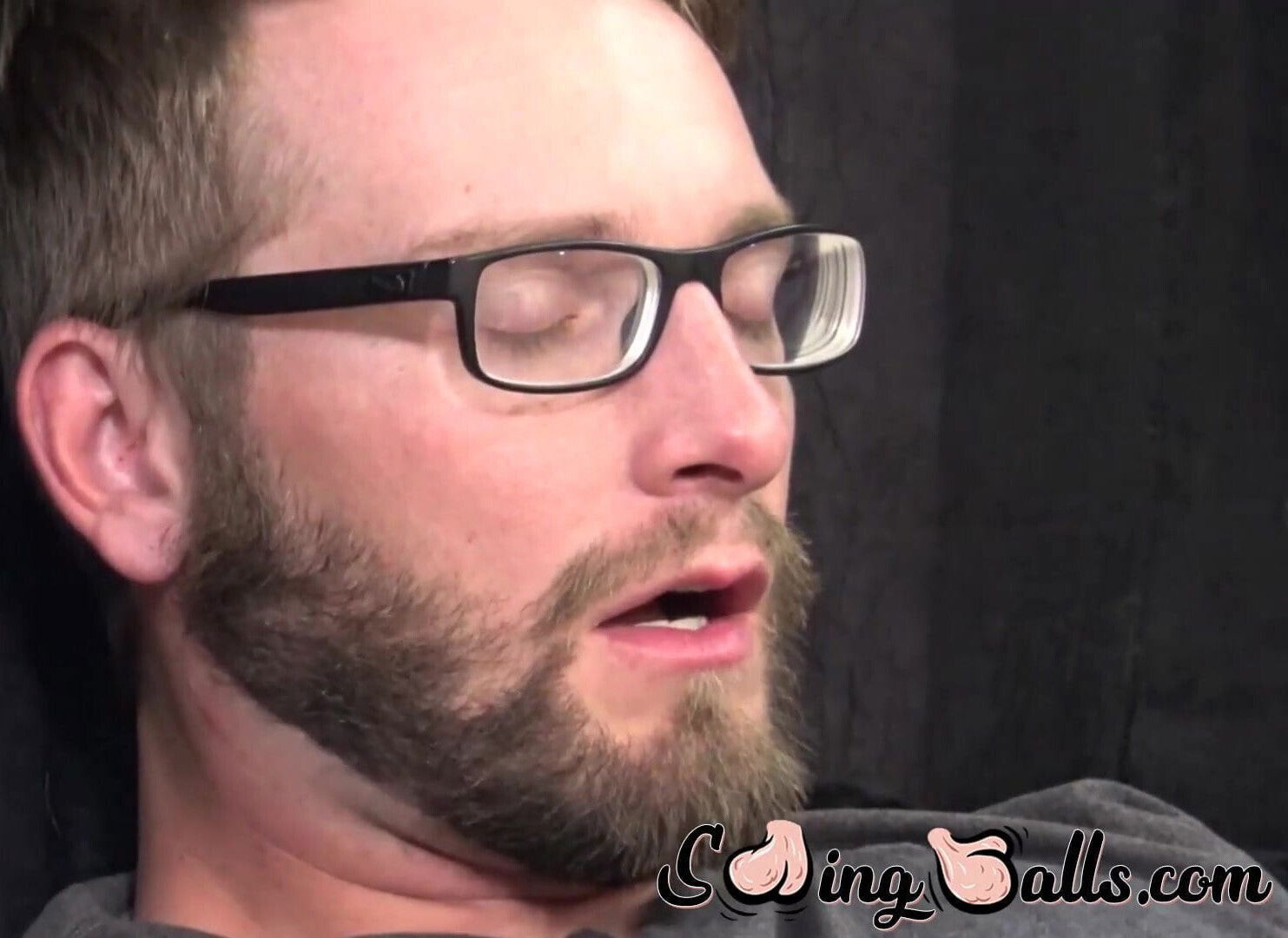 Two buddies with saggy balls masturbate together and cum