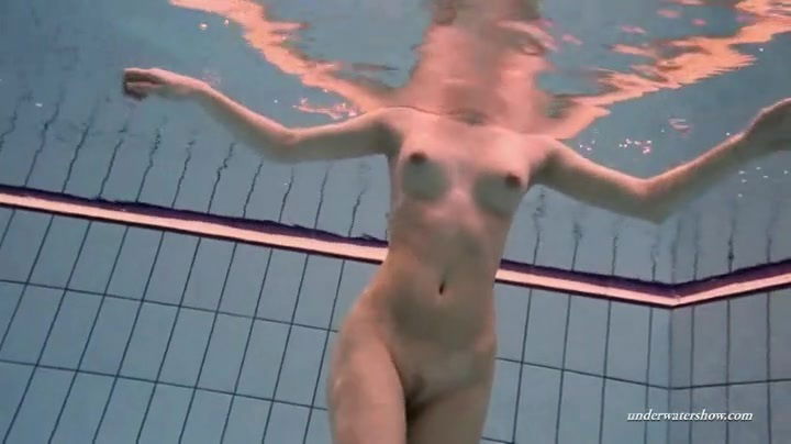 Long legged beauty underwater in the pool