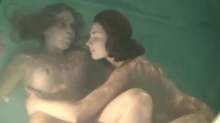 Lesbian foreplay with two babes underwater