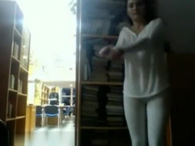 College beauty flashing in the library