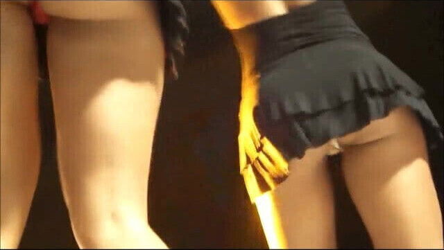Looking up the mini-skirts of girl dancers, panties on show