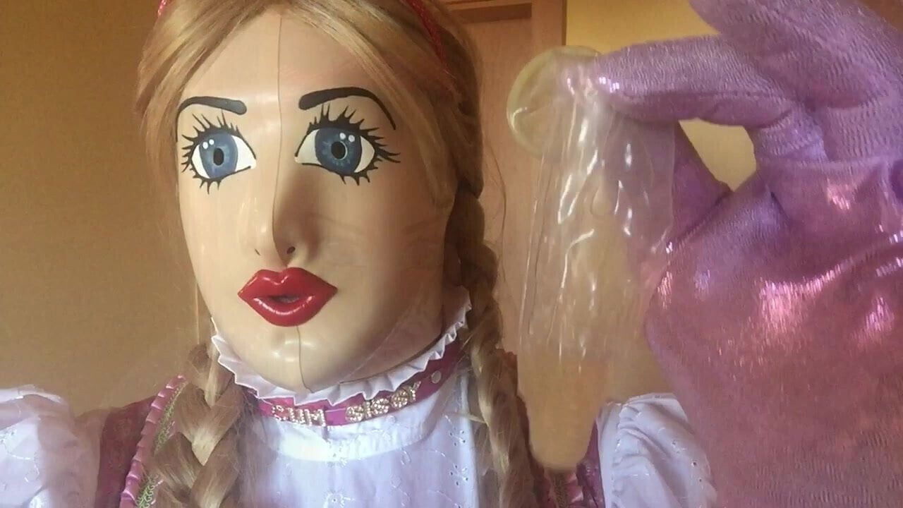 Shemale Dirndl sucks condom