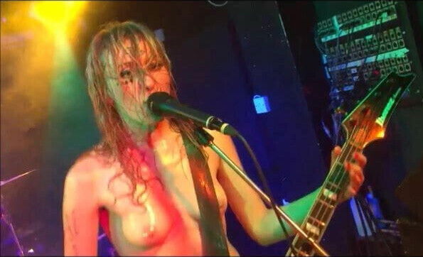 Topless singer tit-jiggling and bouncing them on stage