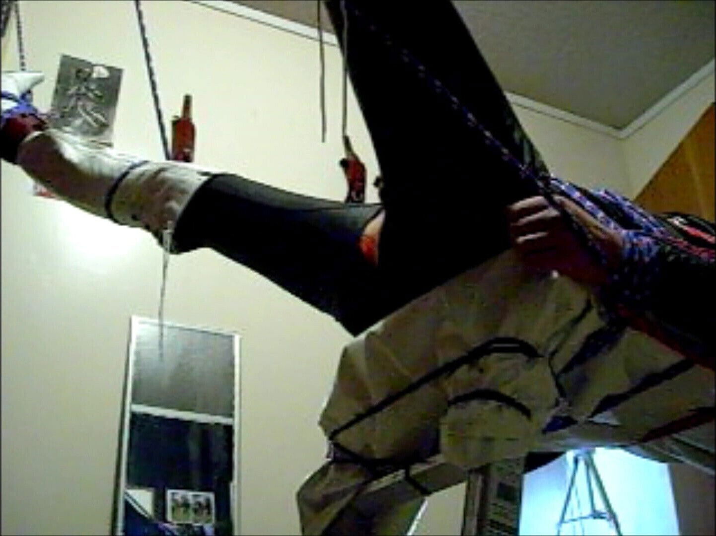 kinky bondage legs strapped