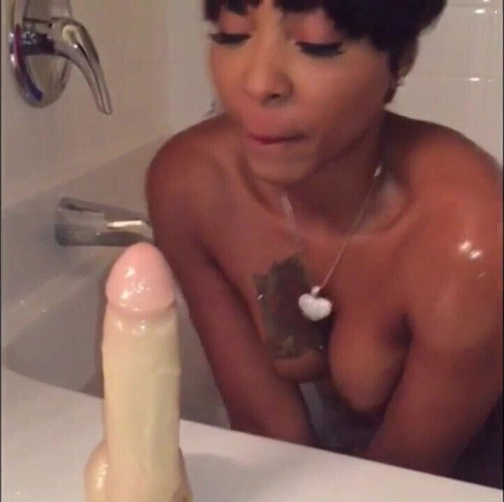 sexy tattoed black milf sucks & rides white dildo