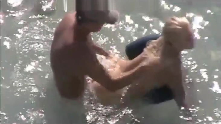 secret voyeur in the water at beach