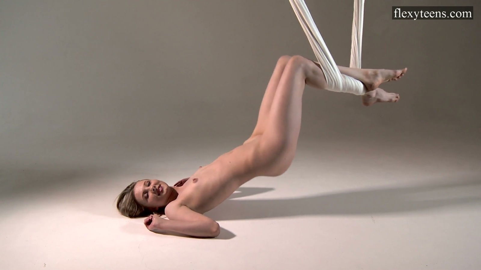 Flexible sporty girl Sofia Zhiraf kinky gymnastics tricks