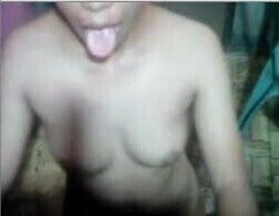 Naked young woman on green chair