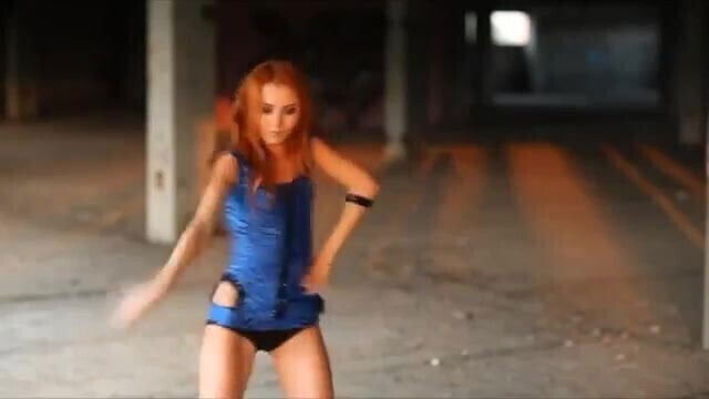 amazingly sexy redhead dancergirl dances to some clubmusic
