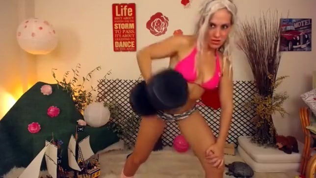 Playful blonde prances pink tiny panties