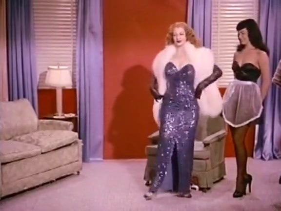 Vintage: Betty Page and Lucy Kraven posing and wrestling